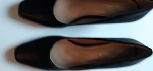 Never worn black and brown heels.